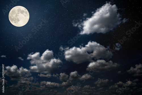 night sky with moon and clouds. Elements of this image furnished by NASA.