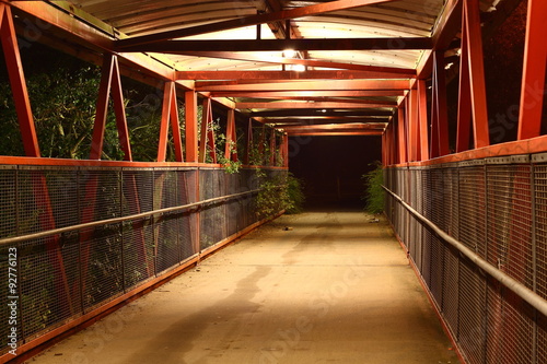 Footbridge night. Covered footbridge with lighting at night.