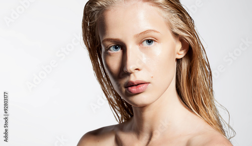 Woman with perfect skin without makeup