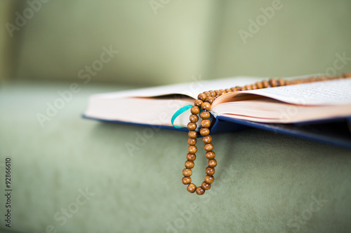 The Koran with rosary beads