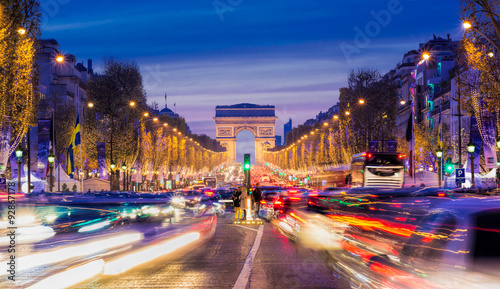 Avenue des Champs-Elysees with Christmas lighting leading up to the Arc de Triomphe in Paris, France