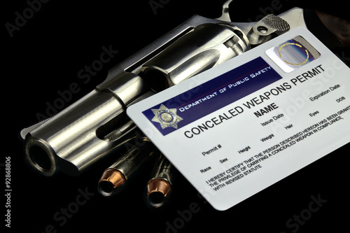 Revolver and Bullets and Concealed Weapon Permit