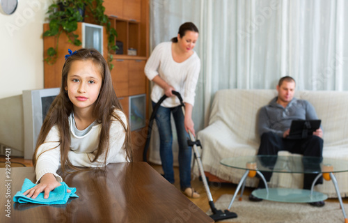 Woman and girl doing cleaning