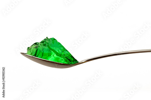 grenn jello on teaspoon isolated