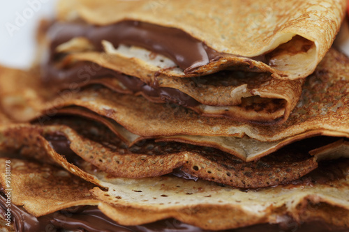 thin crepes or blinis with chocolate cream