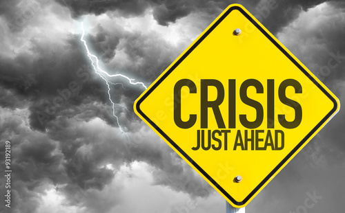 Crisis Just Ahead sign with a bad day