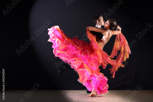 dancers in ballroom isolated on black