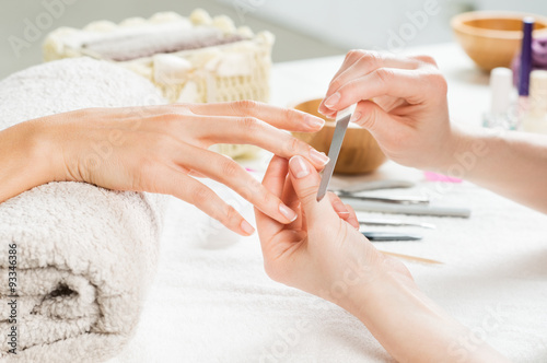 Manicure treatment at nail salon