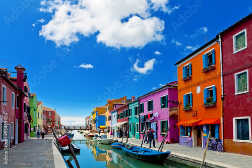 Venice landmark, Burano island, colorful houses and boats, Venice, Italy