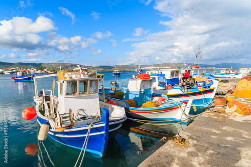 Colourful Greek fishing boats mooring in port on Samos island, Greece