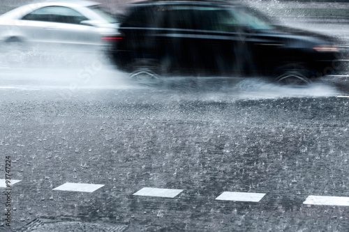 blurred cars in torrential rain