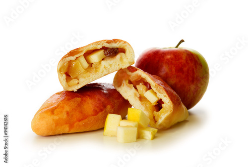 Fresh baked russian pastry pirozhki with apples.