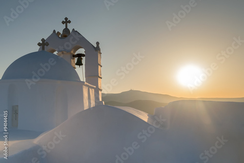 Beautiful church Saint Antony in Paros island in Greece against the sunset. 