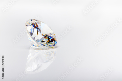 Large diamond isolated on a reflecting surface