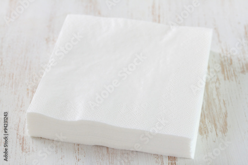 paper napkin on white wooden background