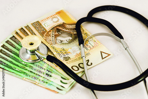 Banknotes and stethoscope