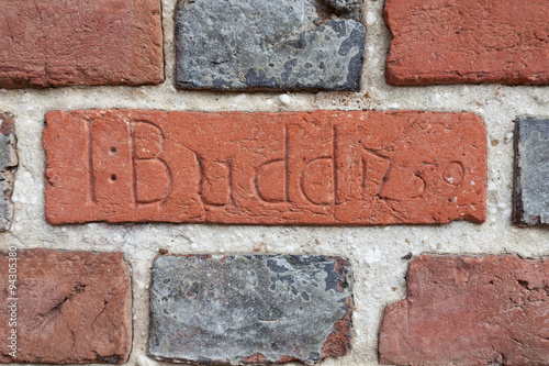 Brick on front wall of The Old School House. 1759