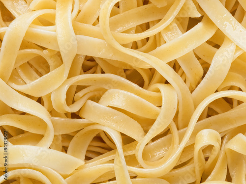 cooked italian fettuccine pasta food background