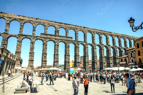 Segovia, Spain - June 29, 2014: People around the famous ancient
