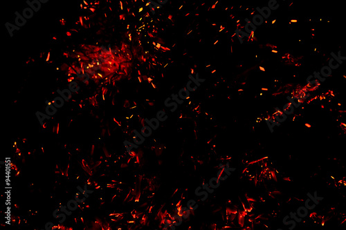 red hot sparks on a black background 