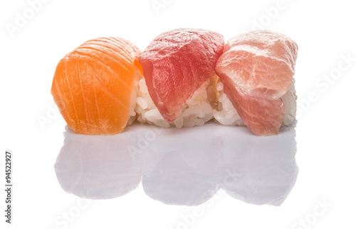 Japanese otoro sushi, red tuna sushi and salmon sushi over white background