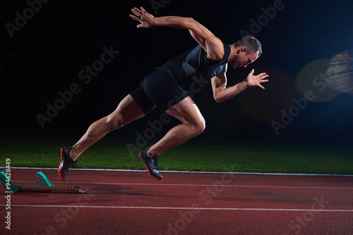 Sprinter leaving starting blocks