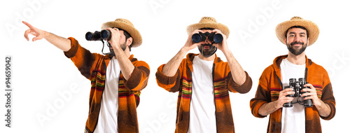 Tourist with binoculars over white background