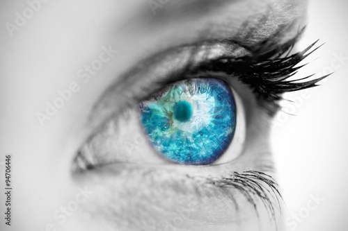 Composite image of blue eye on female face