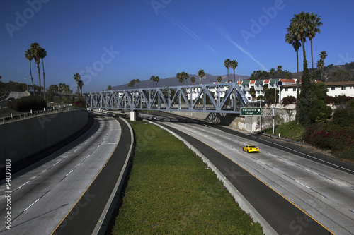 Yellow Corvette drives Route 101 at California Avenue, Ventura, California, USA, 01.29.2014