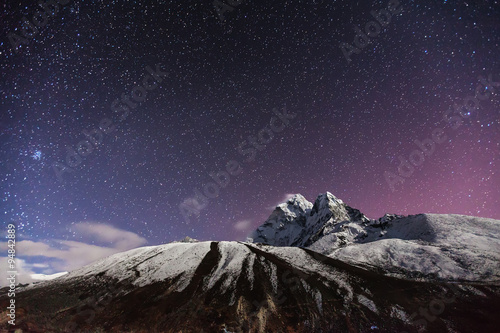 himalaya mountain with star in night time