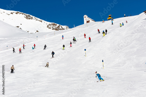 Skiers on crowded ski slope