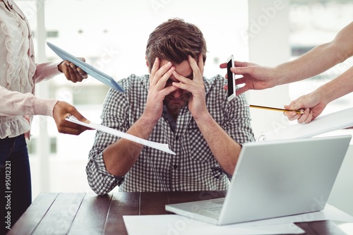 Businessman stressed out at work