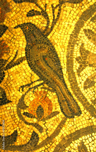 beautiful ancient roman mosaic of a blackbird