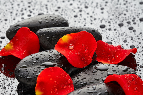 Spa stones with rose petals