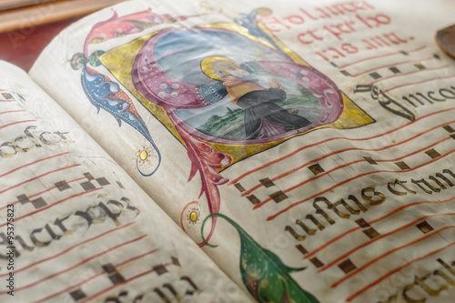 Medieval ancient illuminated manuscript with gregorian chant mus
