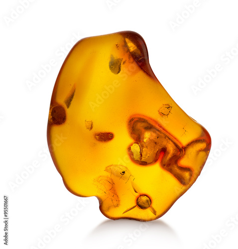 Piece of amber isolated on white background