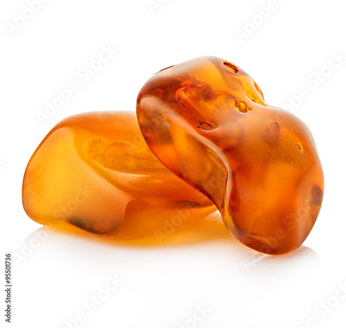 pieces of amber close-up isolated on a white background.