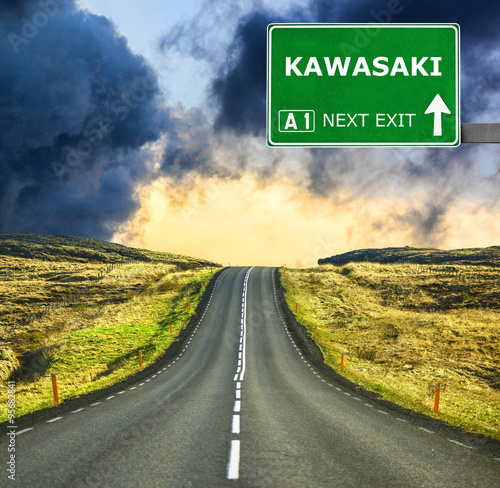 KAWASAKI road sign against clear blue sky