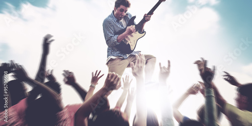 Young Man Guitar Performing Concert Ecstatic Crowds Concept