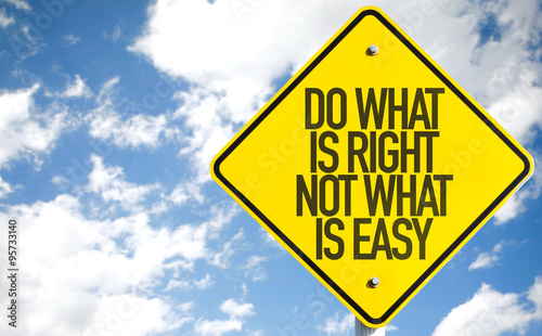 Do What Is What Not What Is Easy sign with sky background