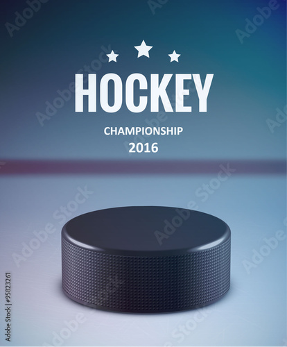 Hockey puck isolated on ice with blur 