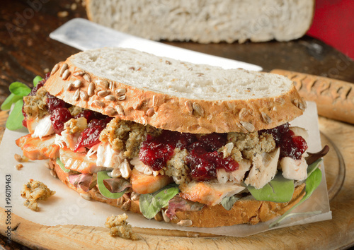 Chicken, turkey sandwich with stuffing and cranberry sauce. Christmas leftovers.