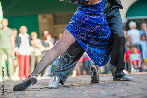 Couple dancing tango in the street