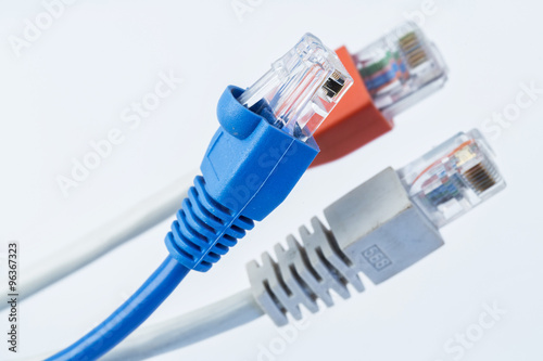 Colorful network cable with RJ45 connectors. Selective focus.