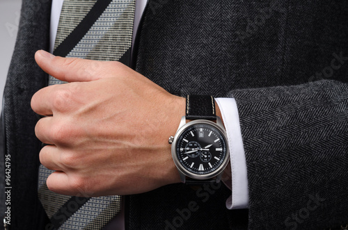 stylish wrist watch on his hand businessman