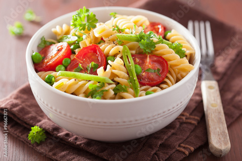 vegetarian pasta fusilli with tomato peas herbs