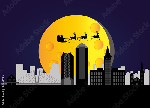 santa flying over the city of cleveland