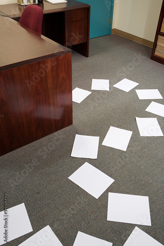 Paper on office floor