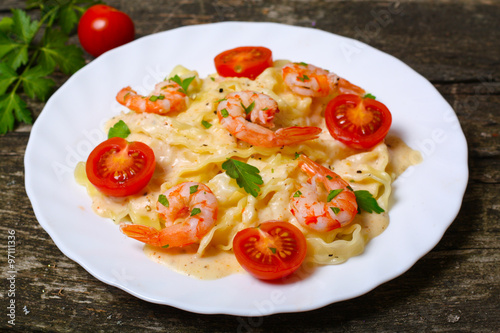 pasta with shrimp, tomatoes, herbs and cream sauce