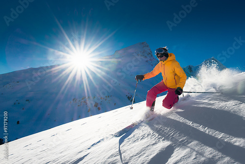 Girl telemark skiing snow slope in mountains
